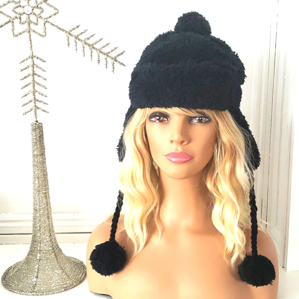 Adorable Super Soft With Braided Pom Poms. Lining Same As Outside Of Hat.